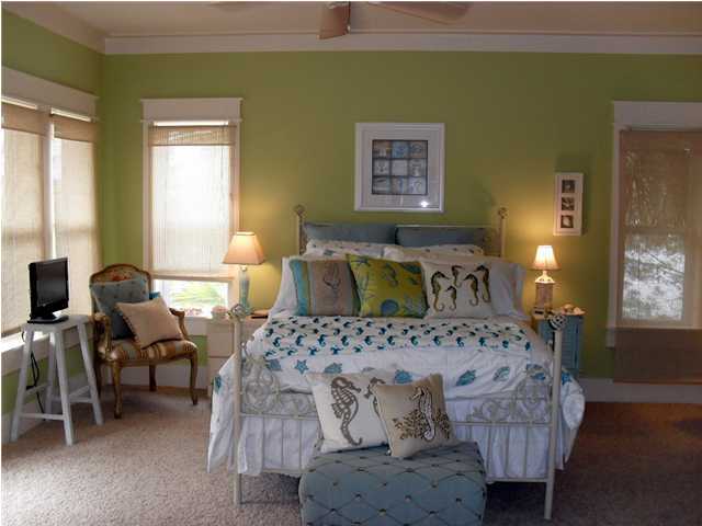 203 Seacrest Beach Boulevard East Seacrest, FL 32461 - Photo 13 of 24 a bedroom with a bed and wooden floor