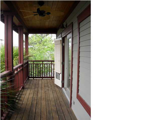 203 Seacrest Beach Boulevard East Seacrest, FL 32461 - Photo 17 of 24 a view of a porch with wooden floor and outdoor space