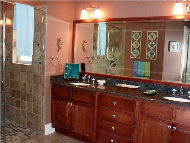 203 Seacrest Beach Boulevard East Seacrest, FL 32461 - Photo 19 of 24 a bathroom with a granite countertop sink and a mirror