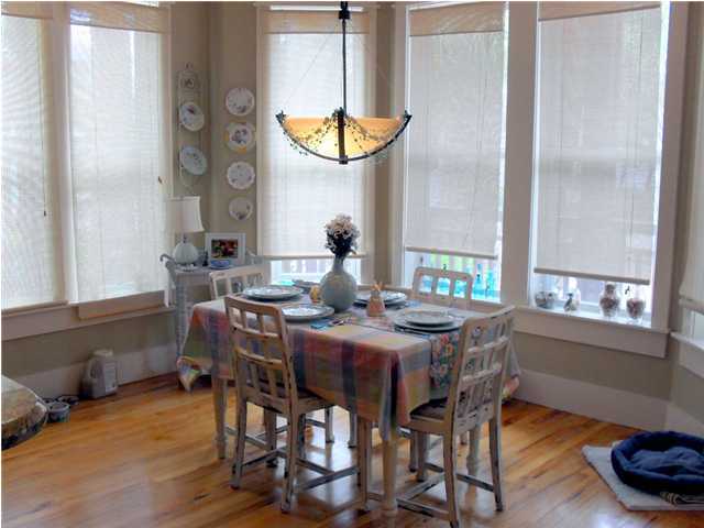 203 Seacrest Beach Boulevard East Seacrest, FL 32461 - Photo 5 of 24 a view of a dining room with furniture window and wooden floor