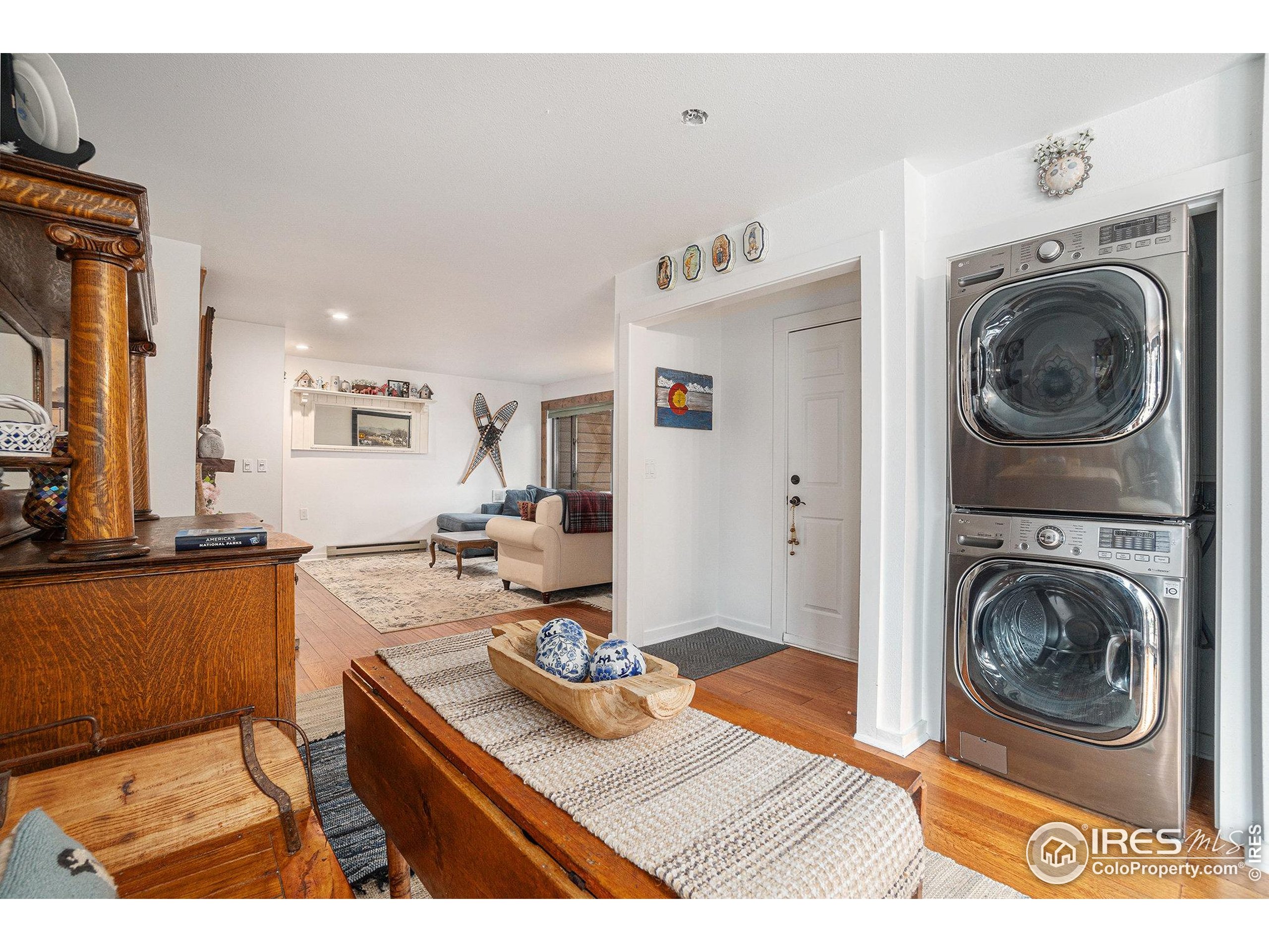 1422 Matthew Circle, Unit 2 Estes Park, CO 80517 - Photo 14 of 30 a living room with furniture and a table