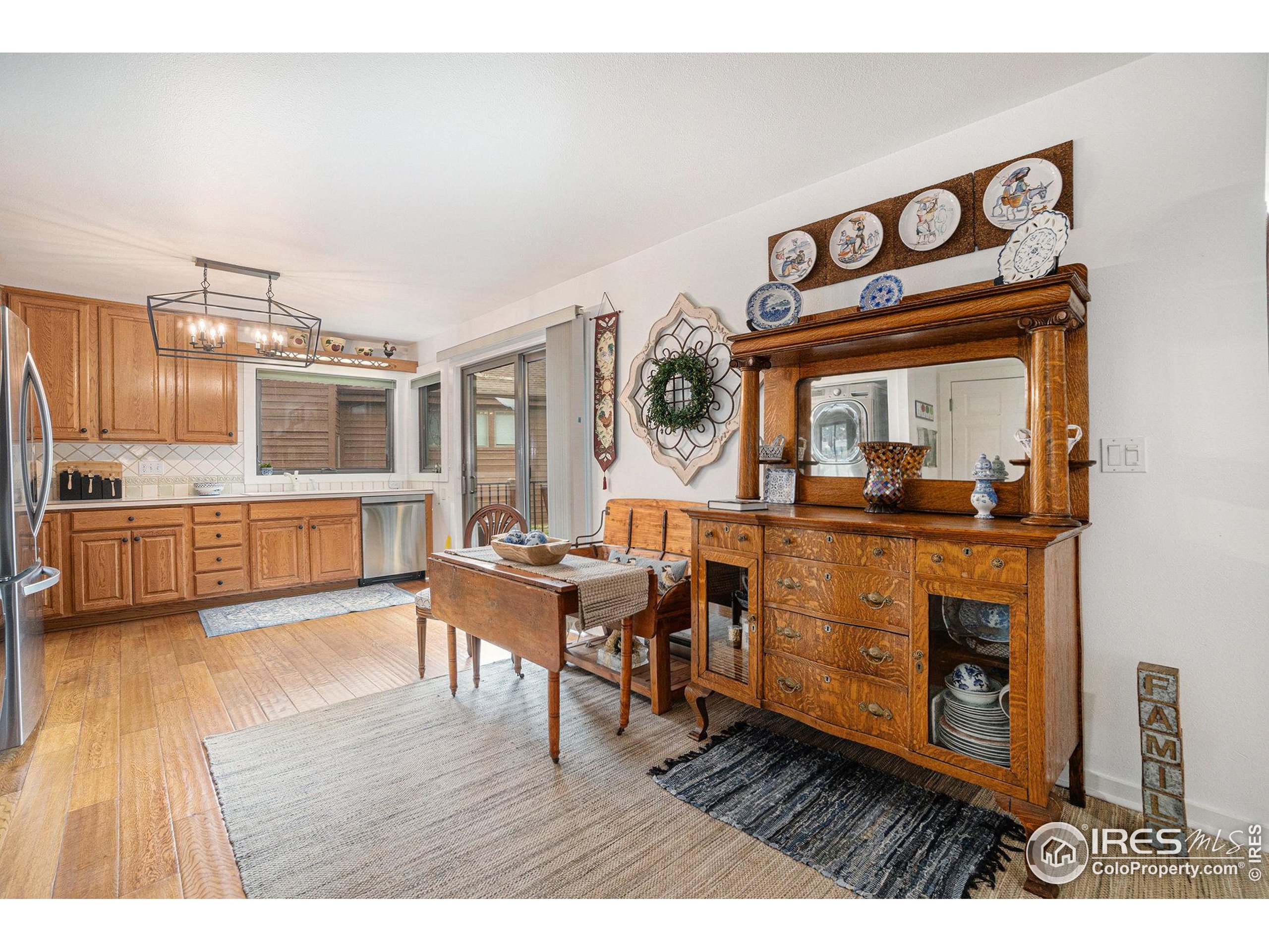 1422 Matthew Circle, Unit 2 Estes Park, CO 80517 - Photo 10 of 30 a living room with furniture and a wooden floor