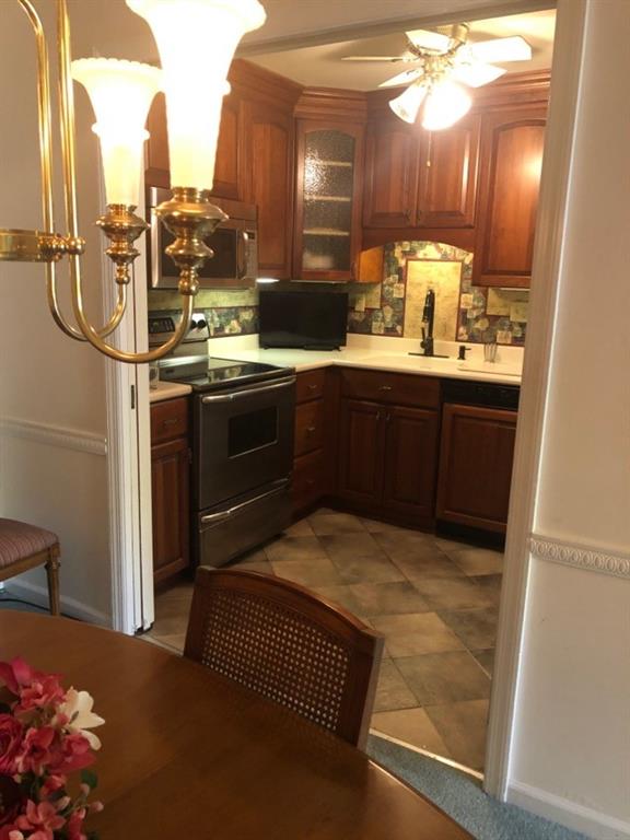 1500 Cochran Road, Unit 611 Pittsburgh, PA 15243 - Photo 12 of 25 Kitchen entry has pocket doors.