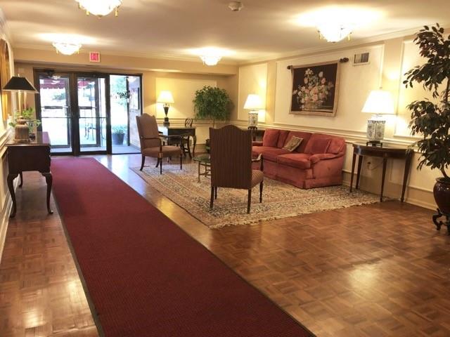 1500 Cochran Road, Unit 611 Pittsburgh, PA 15243 - Photo 4 of 25 Secure entry leads to an attractive lobby area for waiting, relaxing, or even chatting with a friend or two.