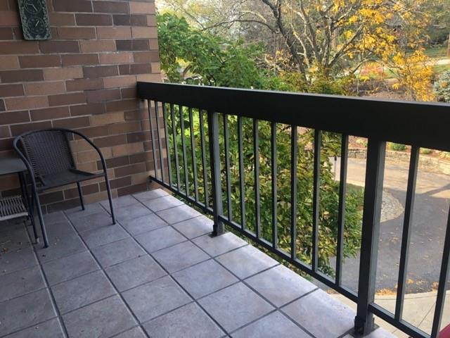 1500 Cochran Road, Unit 611 Pittsburgh, PA 15243 - Photo 10 of 25 Watch the comings and goings from the balcony off of the Living Room with a nicely tiled floor.