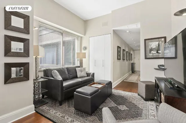 a bedroom with a bed and a table