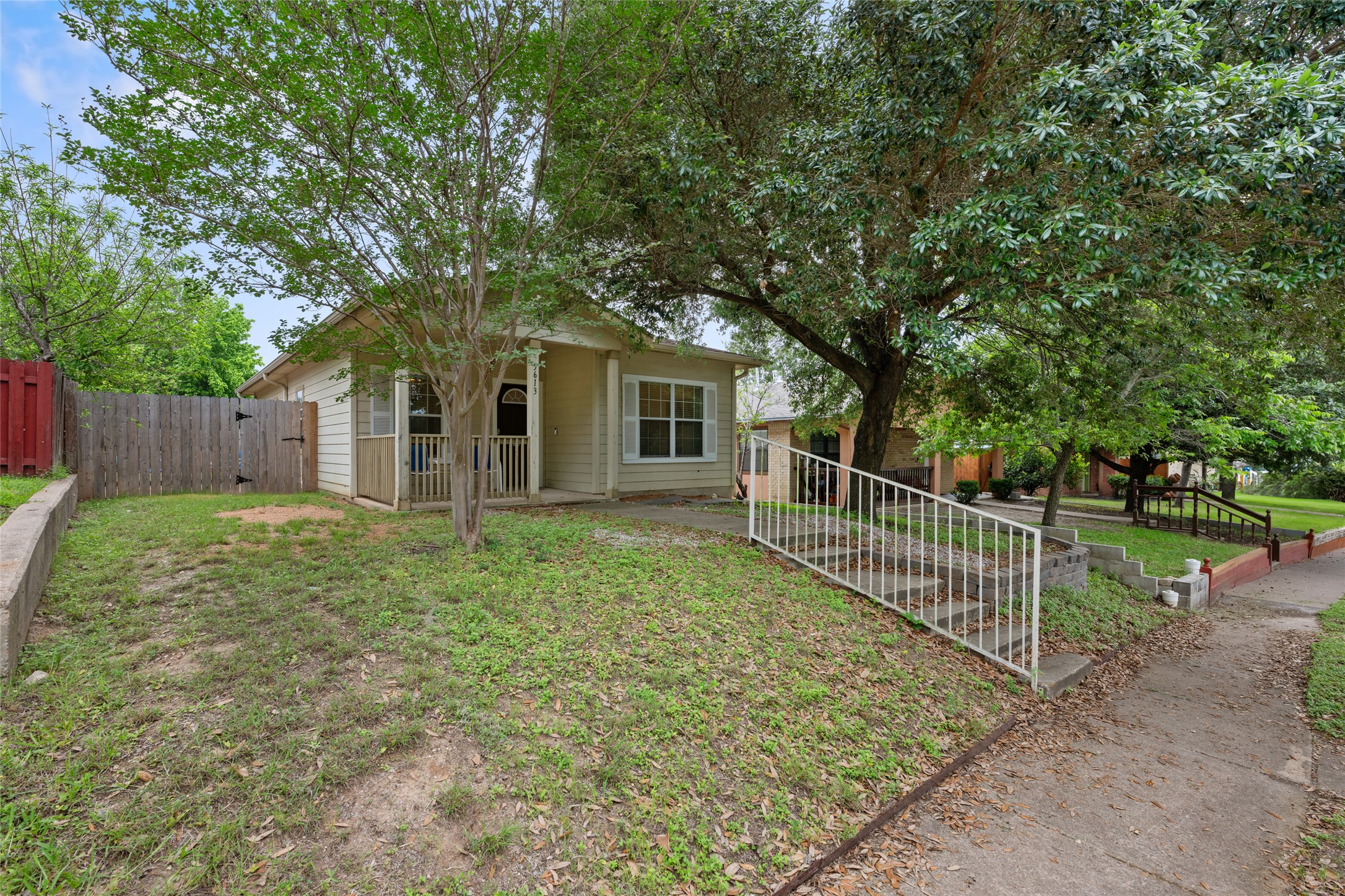 5613 Signal Point Austin, TX 78724 - Photo 2 of 21 Single-story residence featuring light-colored siding and a covered front porch