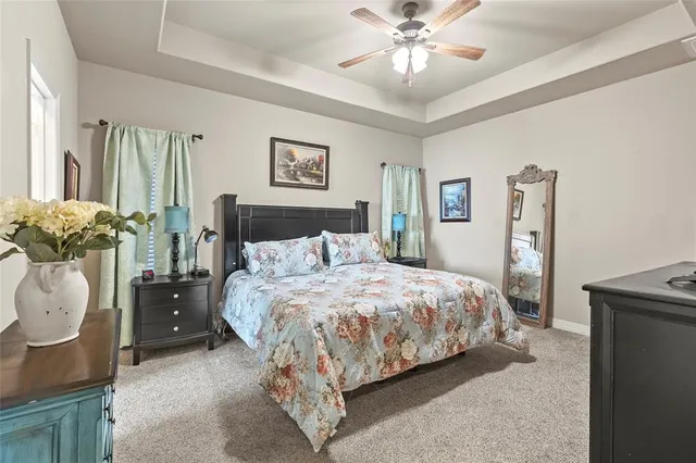 a bathroom with a toilet a sink and a mirror