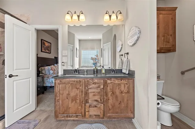 a bedroom with furniture and window