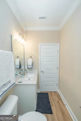 a bathroom with a toilet and a bathtub