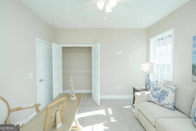 a spacious bedroom with a large bed and a window