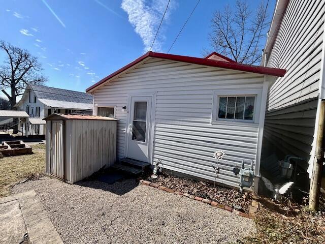 32 2nd Street Lancaster, OH 43130 - Photo 22 of 23 Back door leads to metal storage shed
