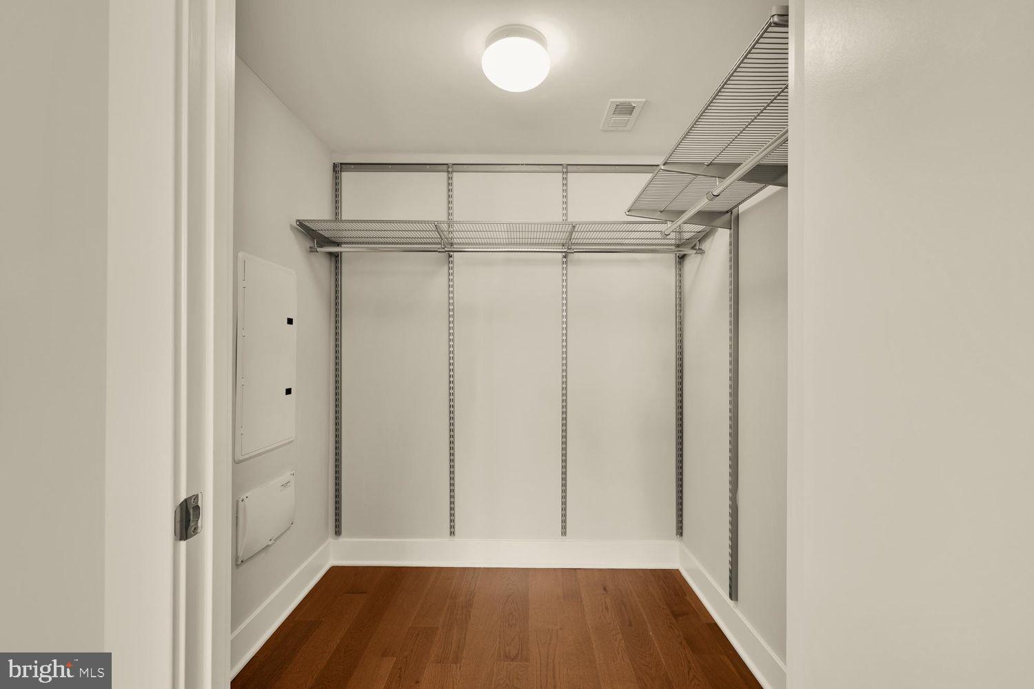 1311 13th Street Northwest, Unit 305 Washington, DC 20005 - Photo 21 of 29 a view of walk in closet with empty racks