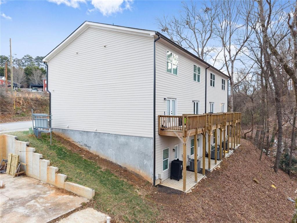 2486 Hidden Cove Court Gainesville, GA 30501 - Photo 4 of 29 a view of a house with a yard