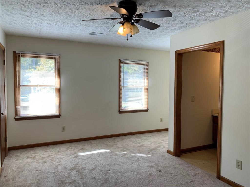 1103 Booth Court Southwest, Unit 1103 Marietta, GA 30008 - Photo 20 of 30 an empty room with a window