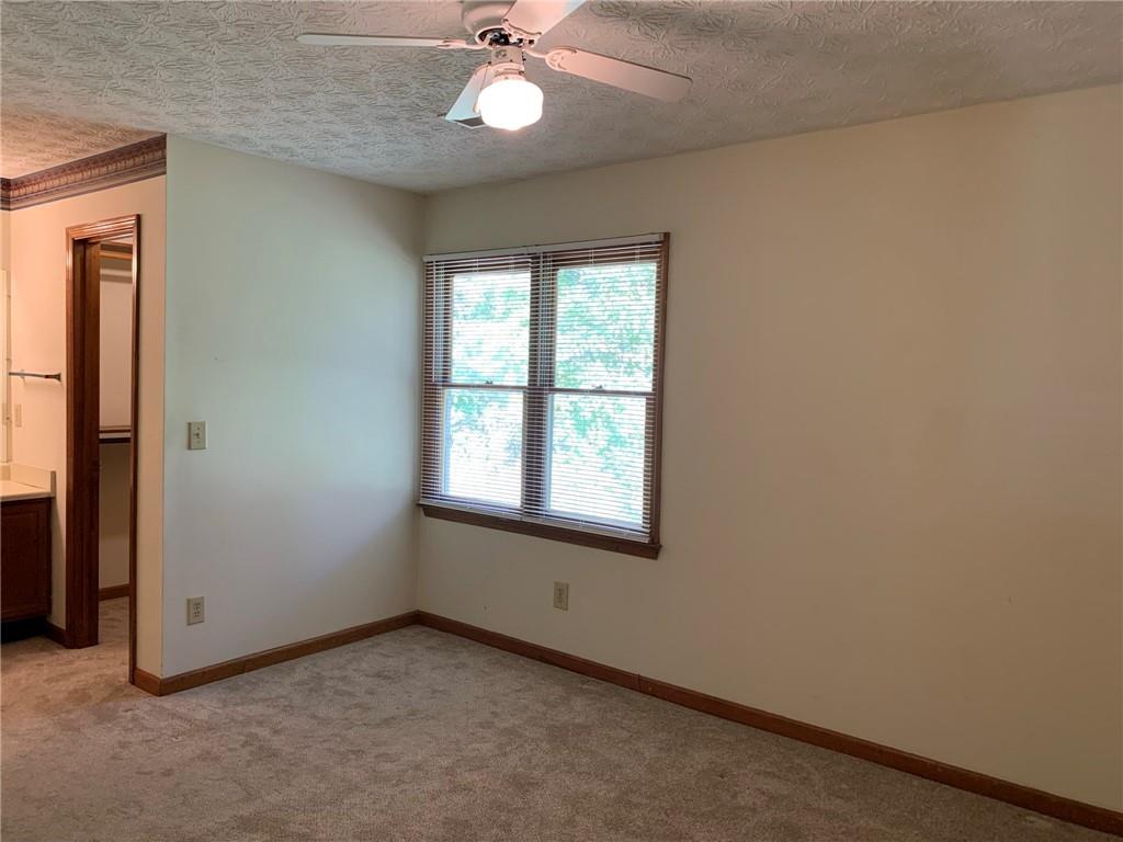 1103 Booth Court Southwest, Unit 1103 Marietta, GA 30008 - Photo 25 of 30 an empty room with a window