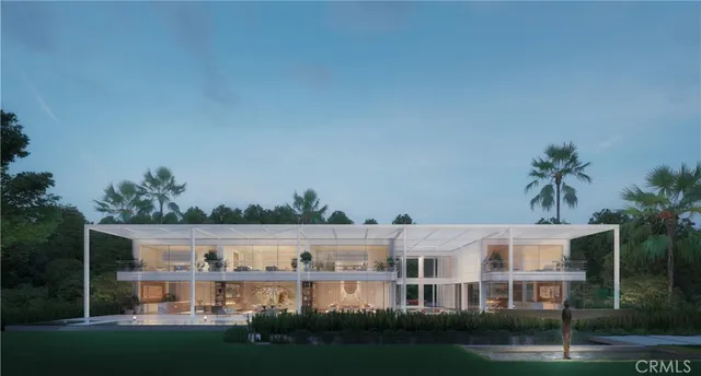 a front view of residential houses with yard and green space