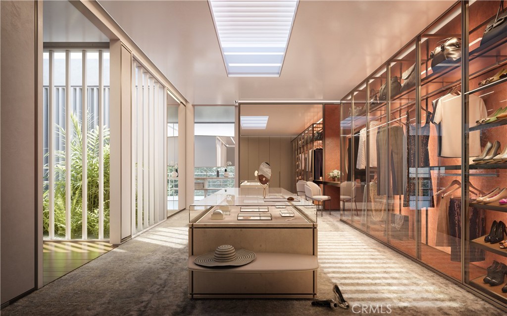 332 Bel Air Road Los Angeles, CA 90077 - Photo 13 of 20 a living room with furniture and a floor to ceiling window