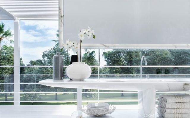 a view of a living room with a fireplace