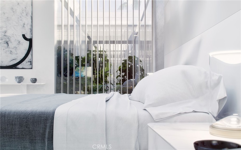 332 Bel Air Road Los Angeles, CA 90077 - Photo 19 of 20 a bed sitting in a bedroom next to a window