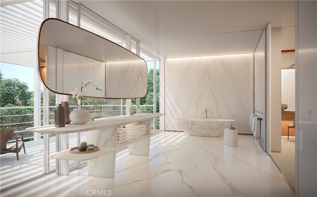 332 Bel Air Road Los Angeles, CA 90077 - Photo 7 of 20 a bathroom with a double vanity sink and a mirror