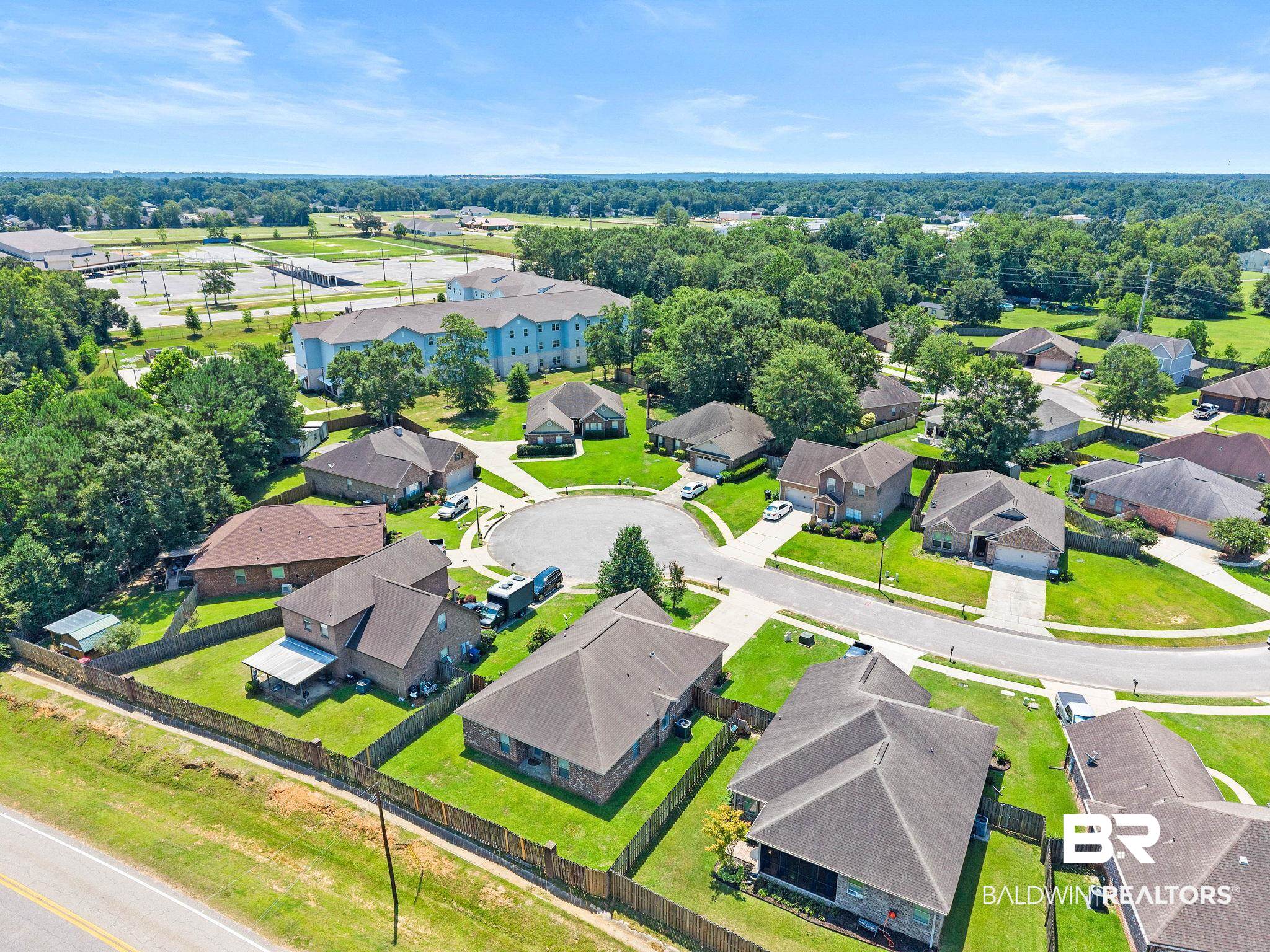 2216 Livingstone Court Mobile, AL 36695 - Photo 55 of 62 Residential development featuring a cul-de-sac street, individual fenced yards, and mature trees