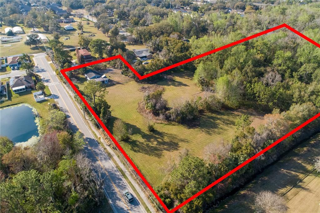 921 Vihlen Road Sanford, FL 32771 - Photo 14 of 26 a view of a park with large trees