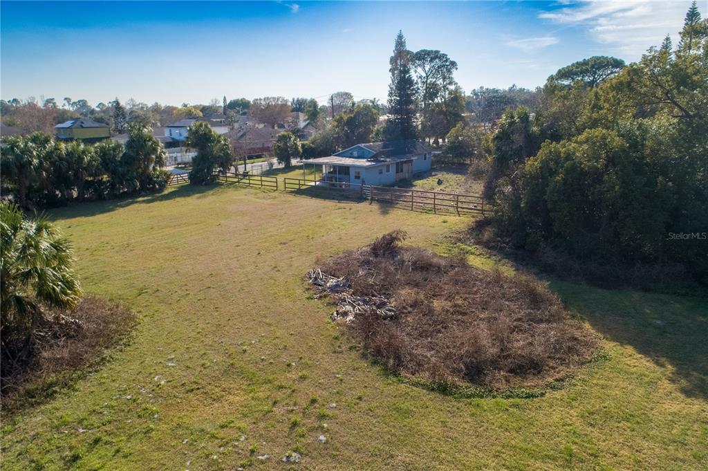 921 Vihlen Road Sanford, FL 32771 - Photo 21 of 26 a view of a lake with a yard