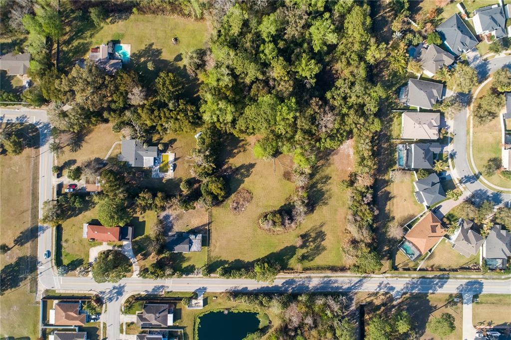 921 Vihlen Road Sanford, FL 32771 - Photo 24 of 26 an aerial view of residential houses with outdoor space