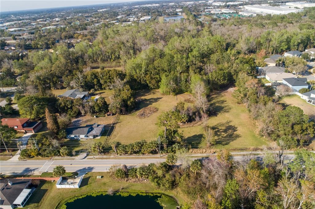 921 Vihlen Road Sanford, FL 32771 - Photo 3 of 26 a view of a yard with mountain and lake view