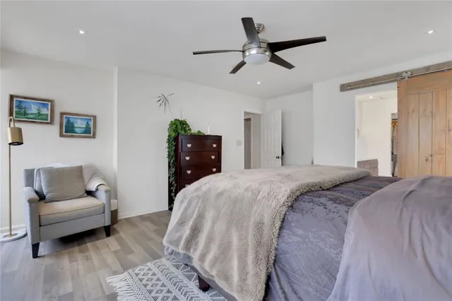 a bed room with a bed and a couch