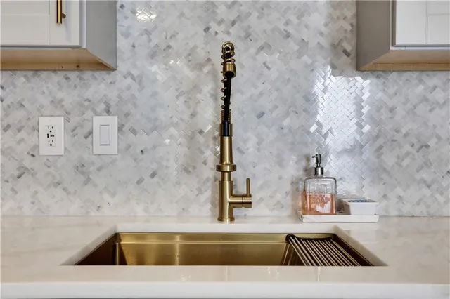 a view of swimming pool from a bathroom