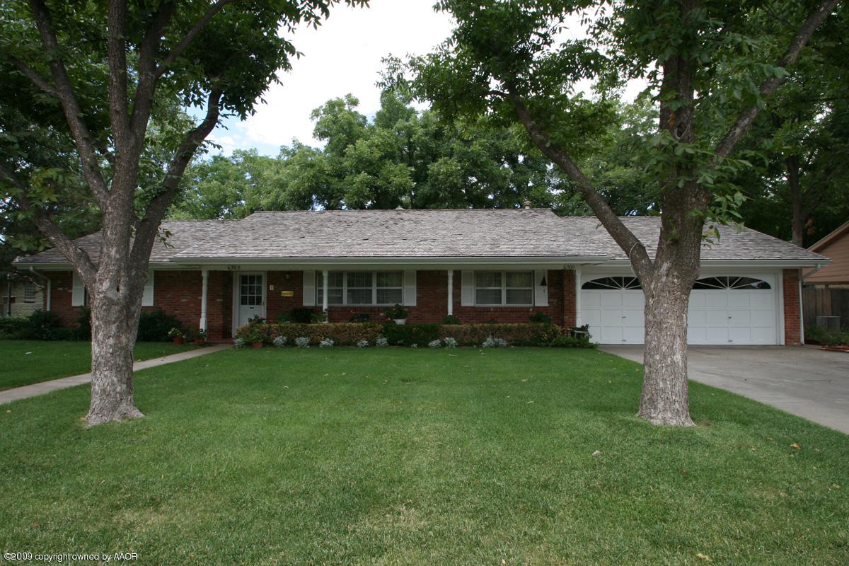 6300 Dreyfuss Road Amarillo, TX 79106 - Photo 22 of 22 a front view of a house with garden