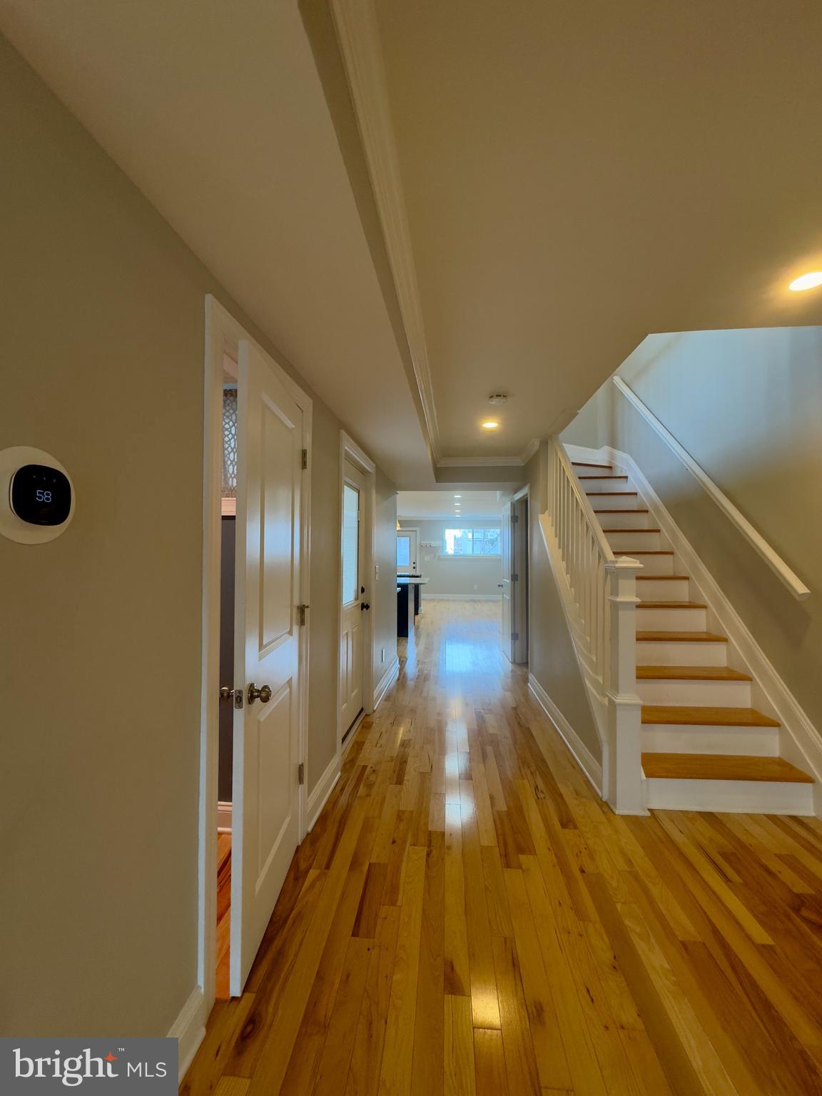 3533 Falls Road Baltimore, MD 21211 - Photo 11 of 20 a view of a hallway with wooden floor