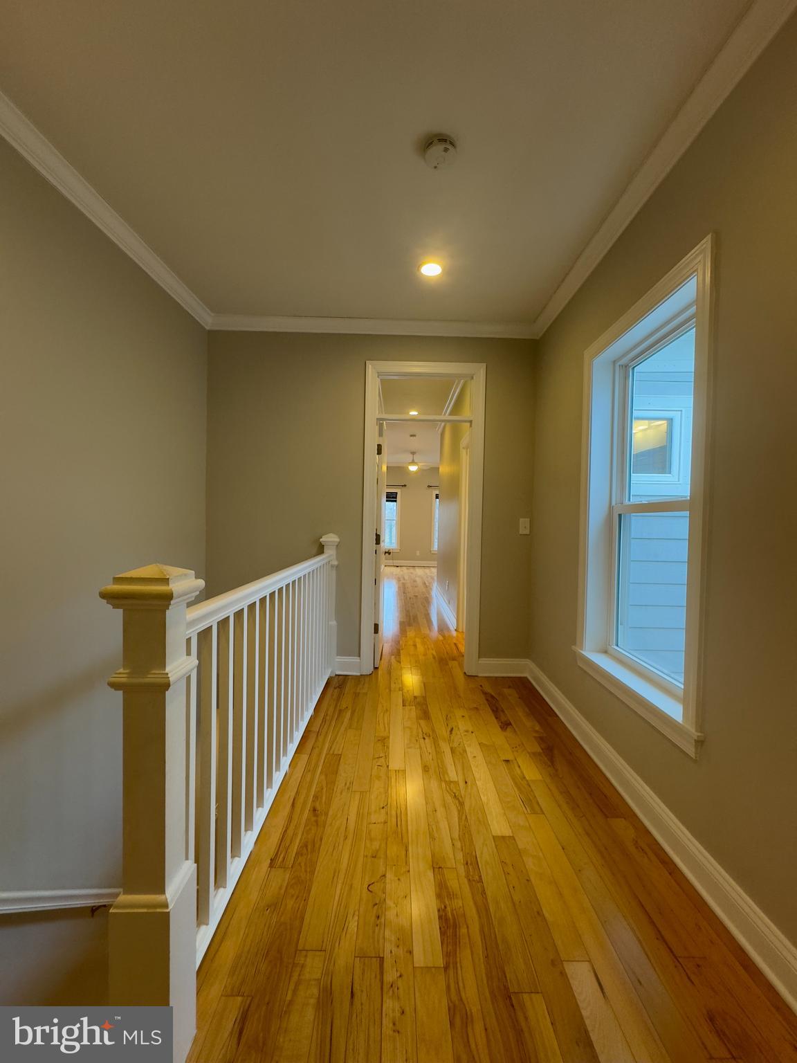 3533 Falls Road Baltimore, MD 21211 - Photo 3 of 20 a view of hallway with wooden floor