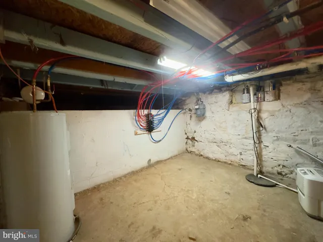 a view of a room with wooden walls