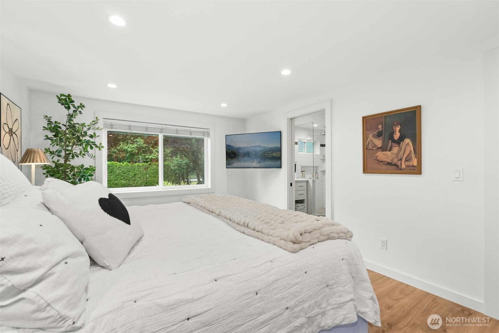 23307 49th Avenue Southeast Bothell, WA 98021 - Photo 14 of 37 a large bedroom with a large bed and a window