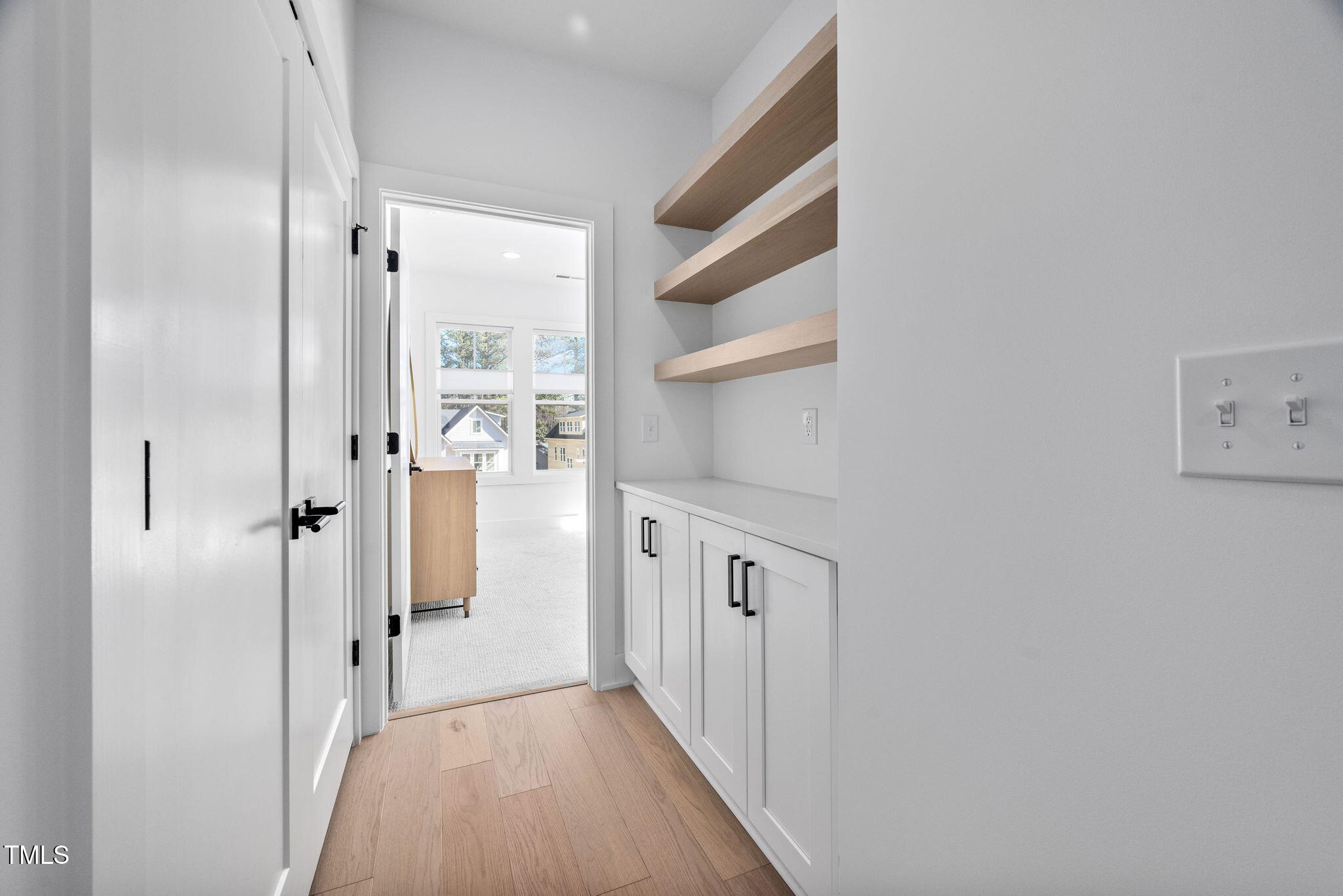 857 Athens Drive, Unit 102 Raleigh, NC 27606 - Photo 19 of 46 Custom Built Ins with lots of storage space