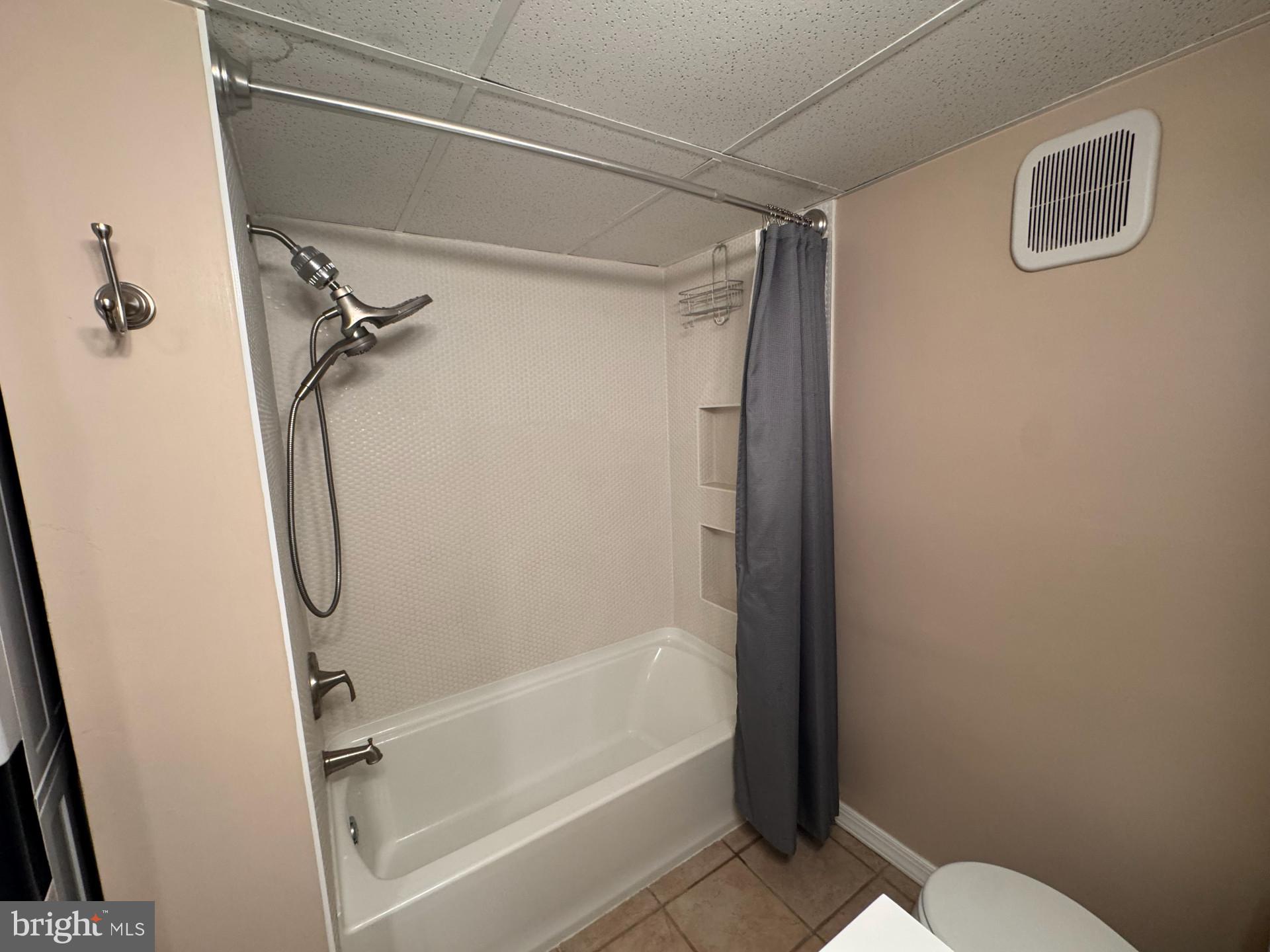 25 South Church Road, Unit 89 Maple Shade, NJ 08052 - Photo 23 of 24 a bathroom with a glass shower door