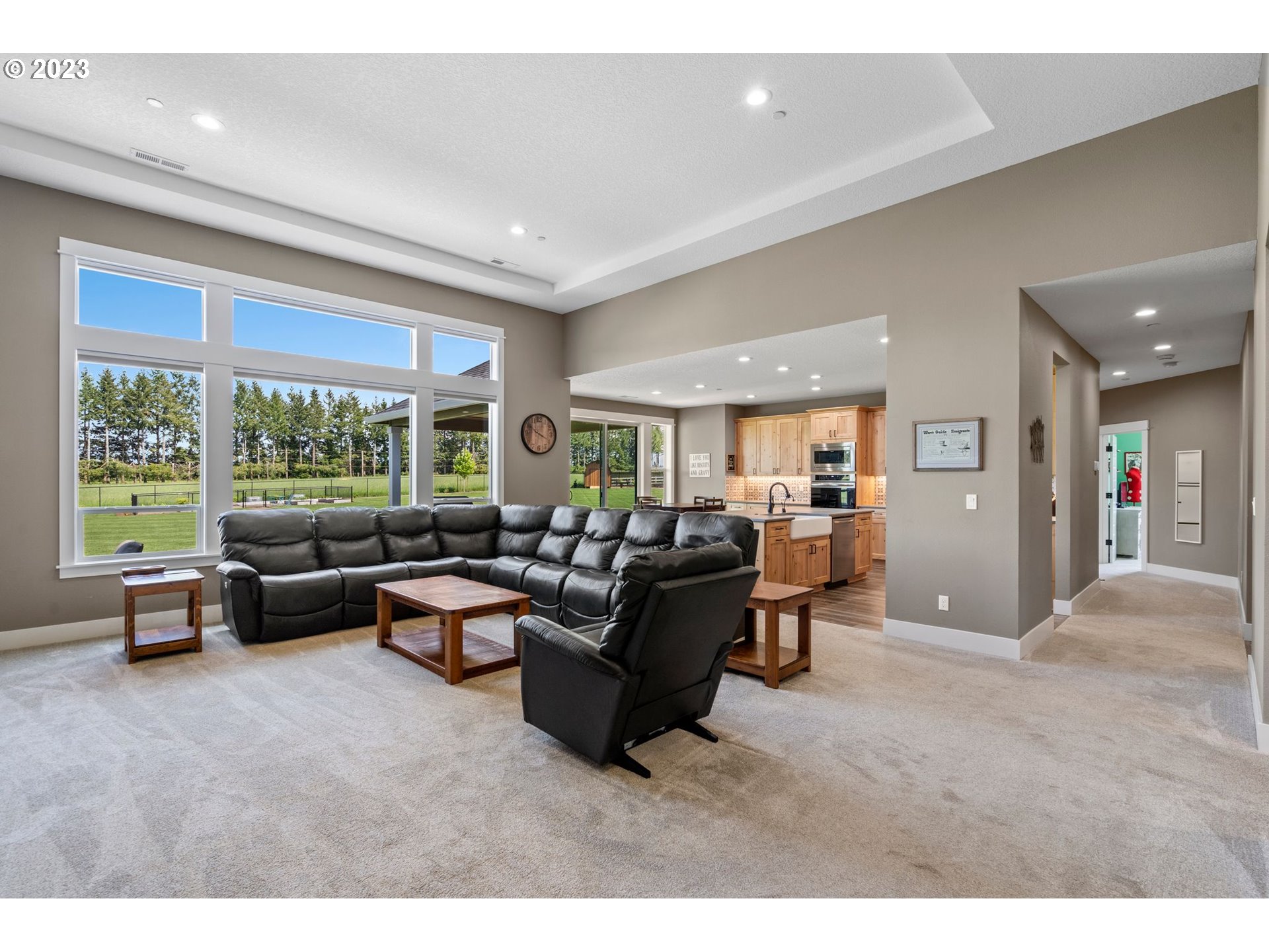 17792 South Strowbridge Road Oregon City, OR 97045 - Photo 18 of 32 a living room with furniture and a large window