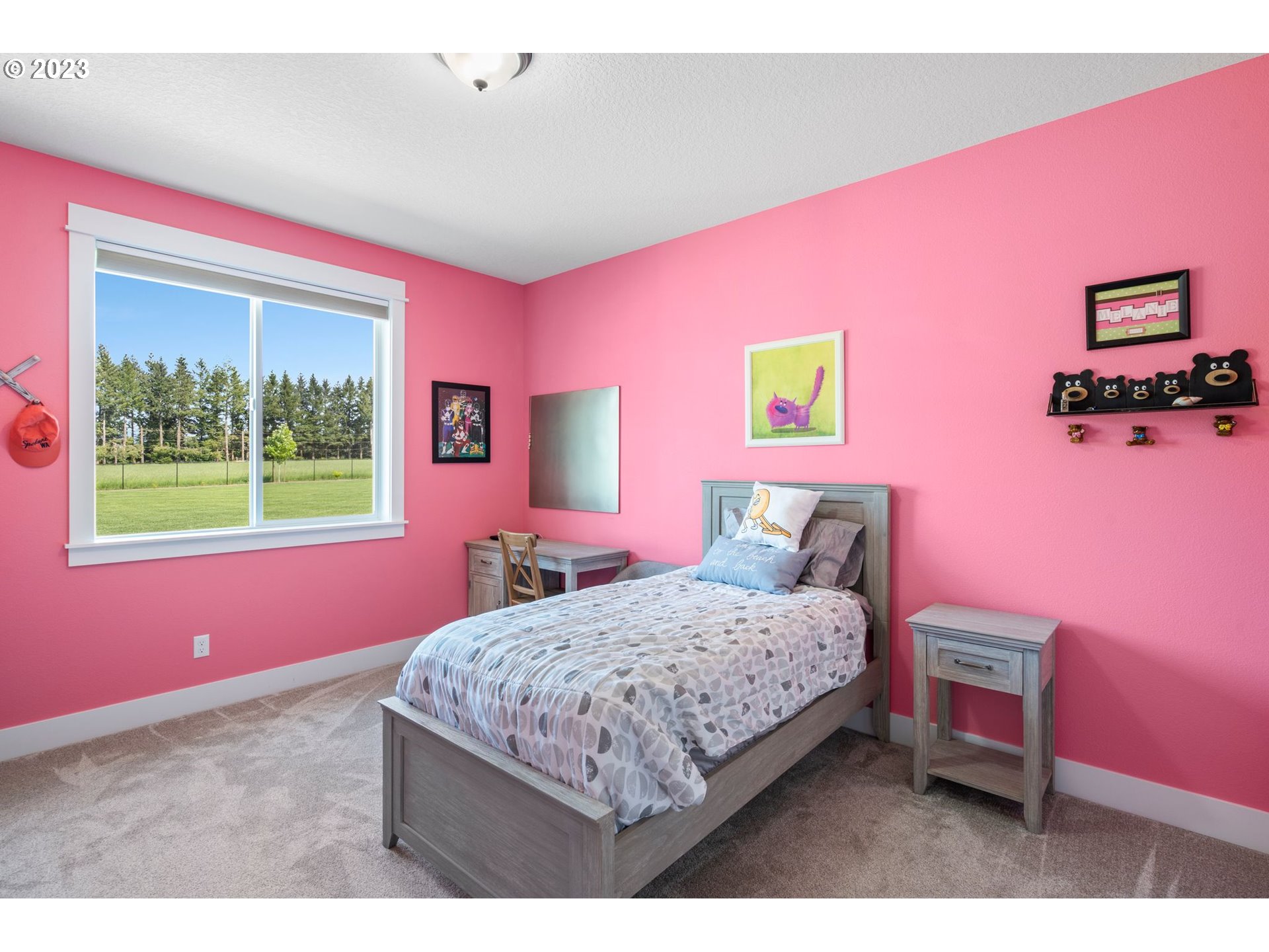 17792 South Strowbridge Road Oregon City, OR 97045 - Photo 28 of 32 a bedroom with a bed a bookshelf and a window
