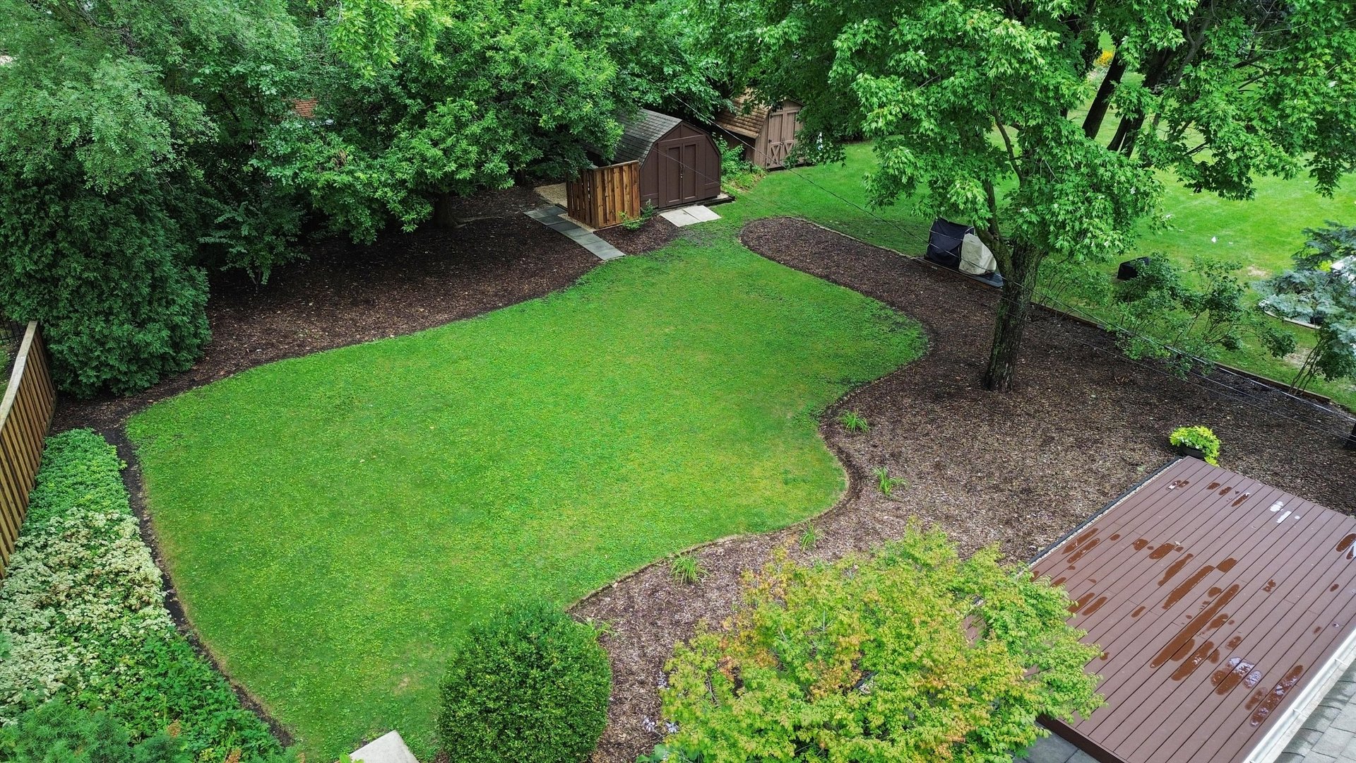 5N260 Eagle Terrace Itasca, IL 60143 - Photo 7 of 34 a view of a backyard with a garden