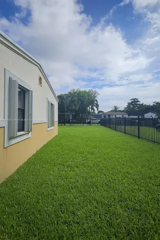 a view of a backyard with a garden