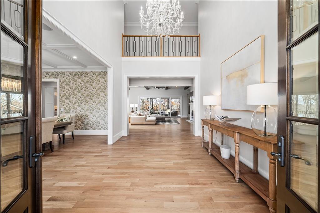 1002 Overlook Terrace Ball Ground, GA 30107 - Photo 11 of 100 a view of living room with furniture and a large window