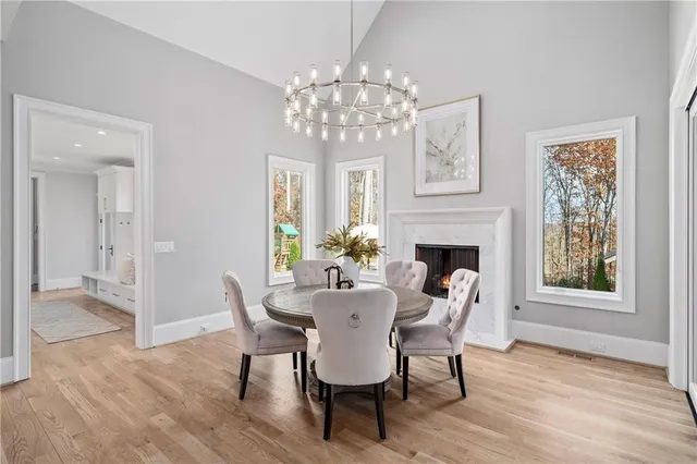 a spacious bathroom with a double vanity sink mirror and toilet