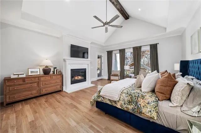 a bathroom with a double vanity sink mirror double and bathtub