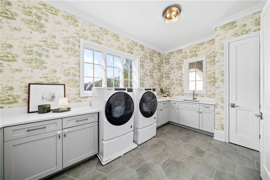1002 Overlook Terrace Ball Ground, GA 30107 - Photo 39 of 100 a kitchen with a refrigerator a stove a sink and a cabinets