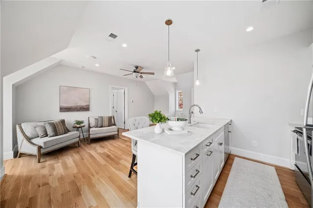 a view of a patio with a dining table and chairs