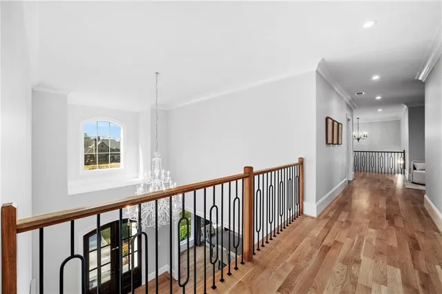 a view of a patio with table and chairs potted plants