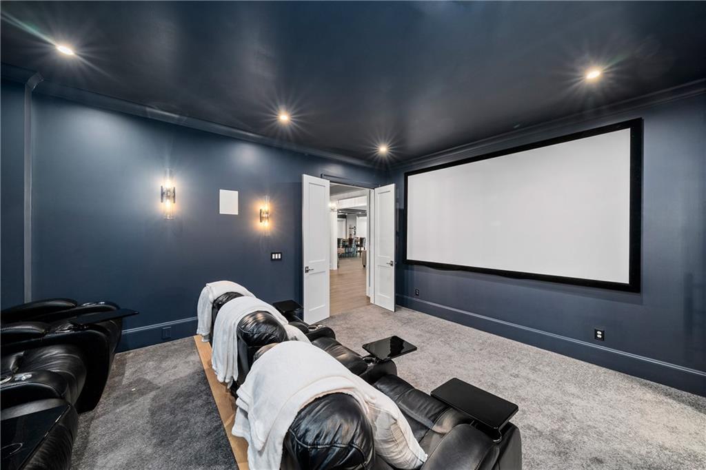 1002 Overlook Terrace Ball Ground, GA 30107 - Photo 67 of 100 a projector room with projector and screen